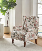 Sillón acentuado tapizado Matteo Floral con adornos de cabeza de clavo