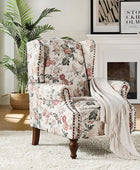 Sillón acentuado tapizado Matteo Floral con adornos de cabeza de clavo